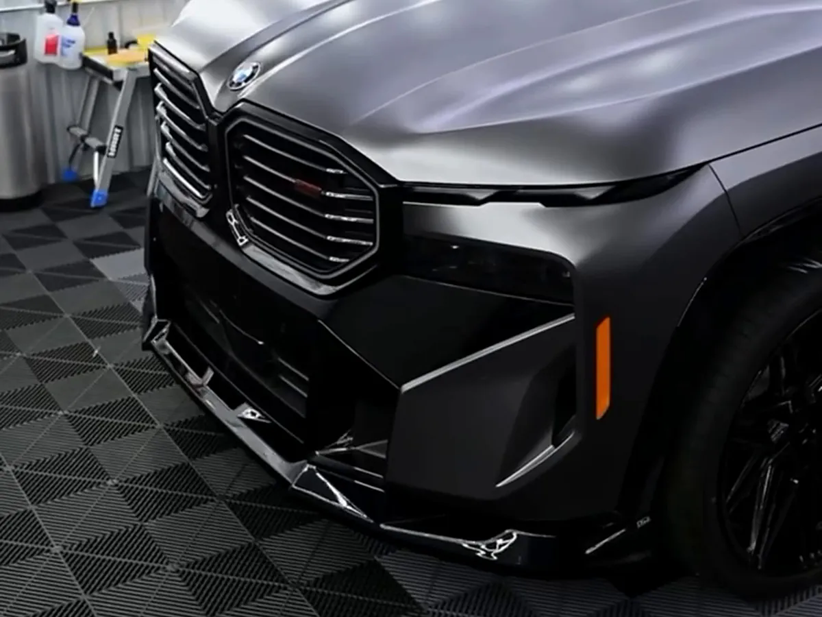 The same XM in the showroom wrapped in 3M satin dark grey.